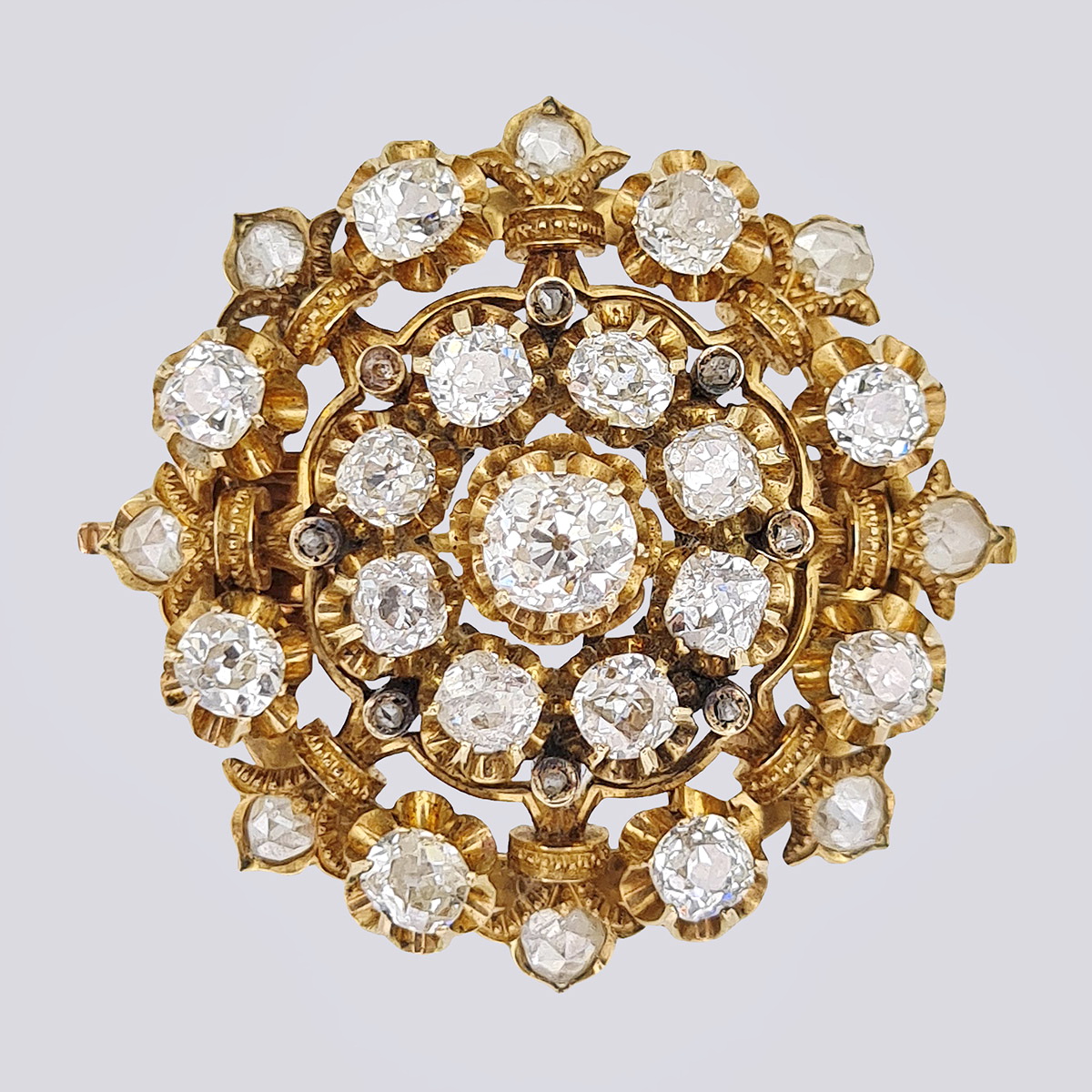 Антикварная золотая брошь 56 пробы с бриллиантами старой огранки и алмазами